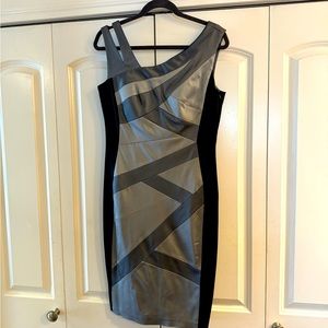 Beautiful satin look bandage dress Size 12. . 40 “ long. Spandex for stretch.